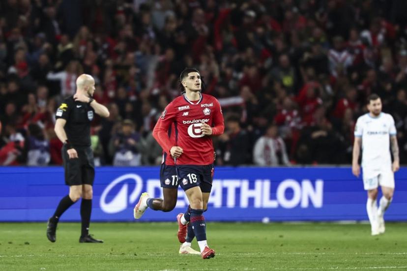 Lille's Belgian forward #19 Matias Fernandez-Pardo (C) reacts after scoring Lille's first goal during the French L1 football match between Lille (LOSC) and Olympique de Marseille (OM) at the Pierre-Mauroy stadium in Villeneuve-d'Ascq, northern France, on May 4, 2025.  Sameer Al-DOUMY / AFP