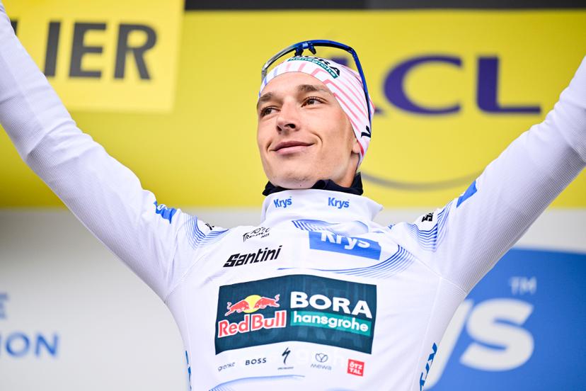 German Florian Lipowitz of RedBull-BORA-hansgrohe celebrates on the podium in the white jersey for best young rider after stage 20 of the 2025 Tour de France cycling race, from Nantua to Montpellier (185km), on Saturday 26 July 2025 in France. The 112th edition of the Tour de France starts on Saturday 5 July in Lille, France, and will finish in Paris, France on the 27th of July. BELGA PHOTO DIRK WAEM