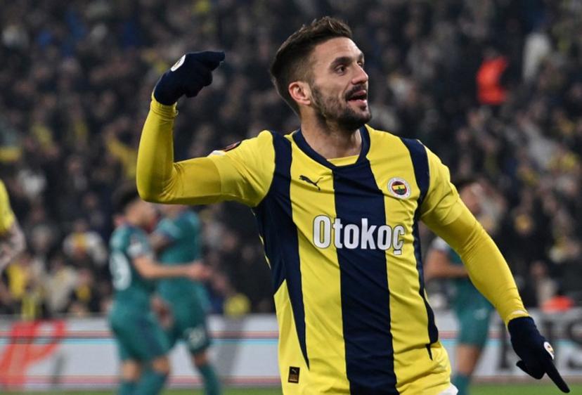 Fenerbahce's Serbian midfielder #10 Dusan Tadic celebrates after scoring his team's first goal during the UEFA Europa League, knockout play off first leg football match between Fenerbahce SK and Anderlecht at Fenerbahce Sukru Saracoglu Stadium in Istanbul, on February 13, 2025.  Ozan KOSE / AFP