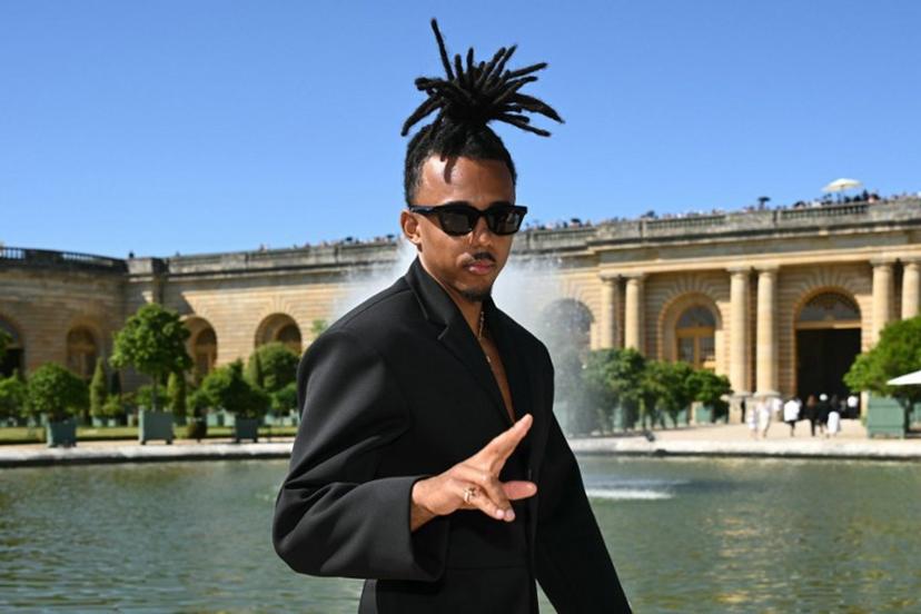 French football player Jules Kounde poses before the Jacquemus Menswear Spring-Summer 2026 collection show as part of the Paris Fashion Week at Orangery of the Palace of Versailles, in Versailles, southwest of Paris, on June 29, 2025.  Bertrand GUAY / AFP