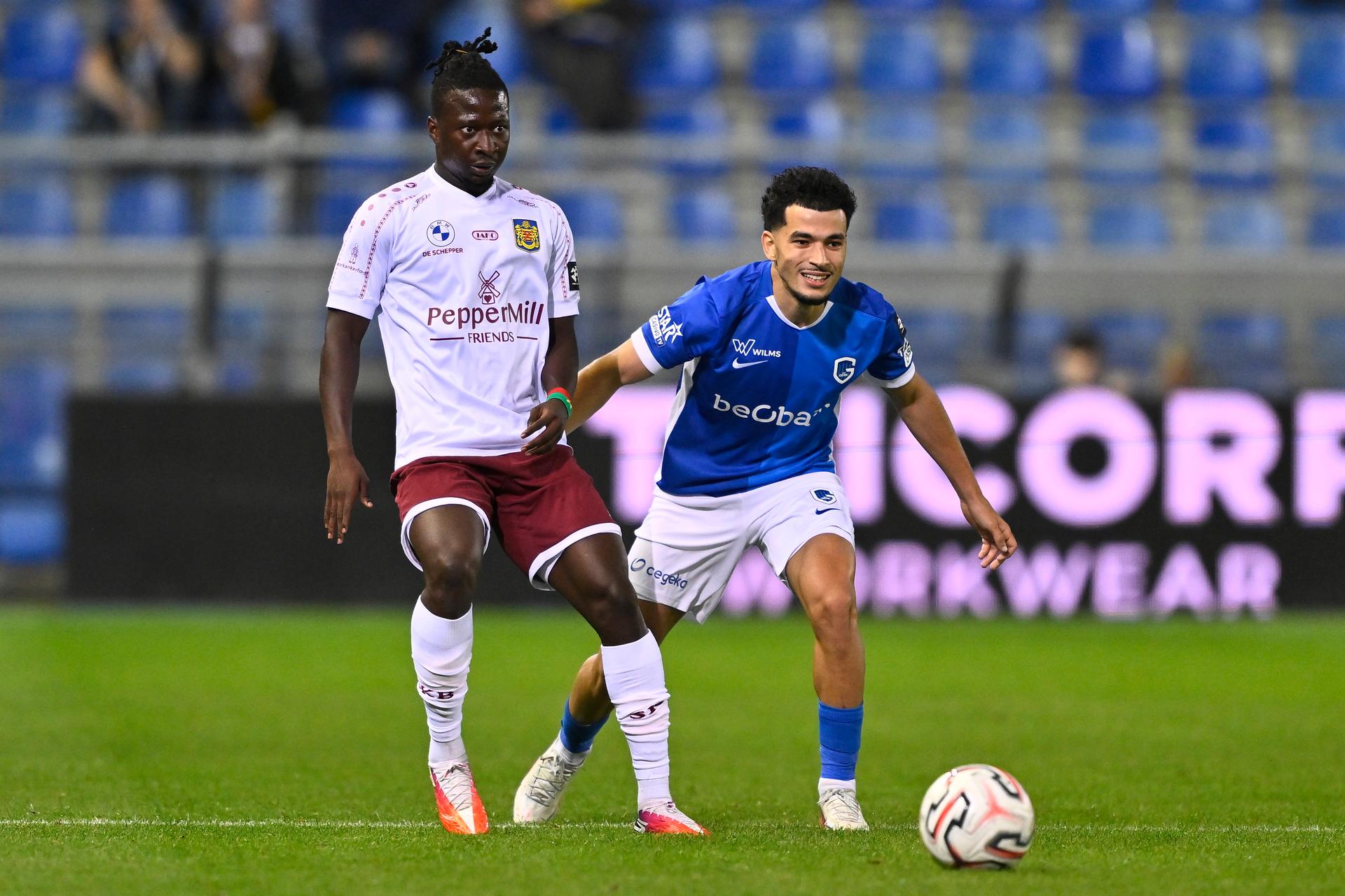 Beveren's Elohim Kabore and Genk's Zakaria El Ouahdi fight for the ball during a soccer match between KRC Genk and SK Beveren, Friday 28 August 2026 in Genk, on day 4 of the 2026-2027 'Jupiler Pro League' first division of the Belgian championship. BELGA PHOTO JOHAN EYCKENS