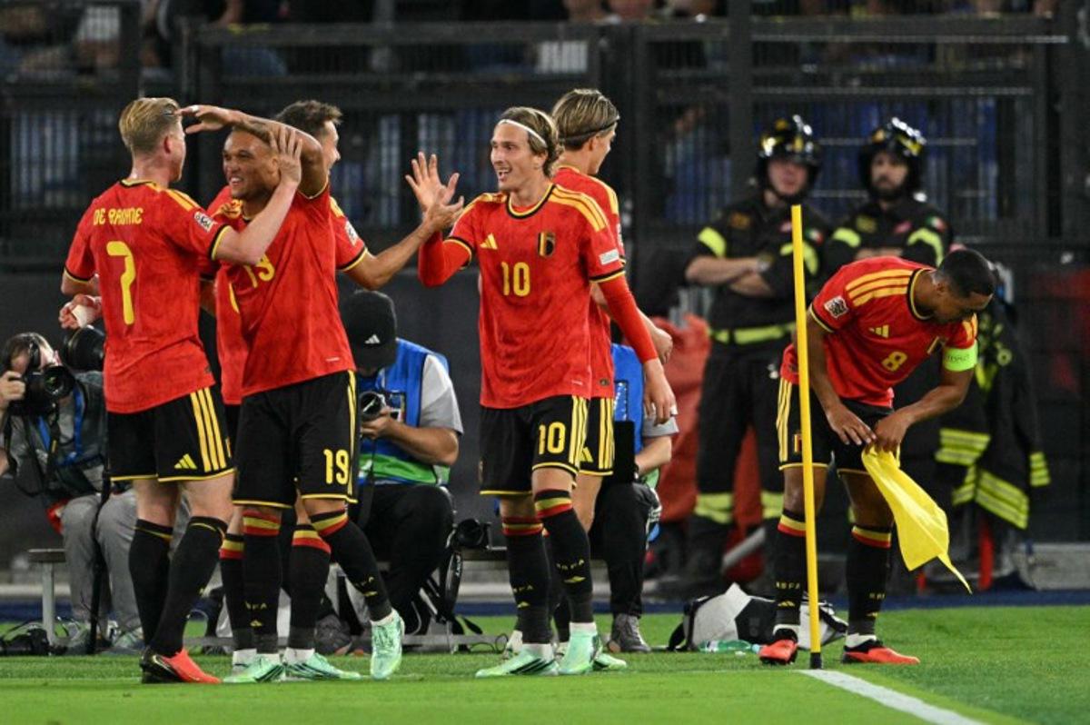 Belgium's forward #10 Mika Godts celebrates scoring his team's first goal during the UEFA Nations League (League A, Group 1) football match between Italy and Belgium at the Olympic Stadium in Rome on September 25, 2026.  Andreas SOLARO / AFP