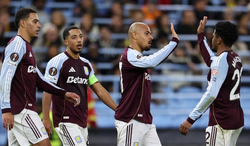 Aston Villa's Dutch defender  #17 Donyell Malen (2R) celebrates scoring his team's second goal during the UEFA Europa League league-stage football match between Aston Villa and Young Boys at Villa Park in Birmingham on November 27, 2025.  Darren Staples / AFP