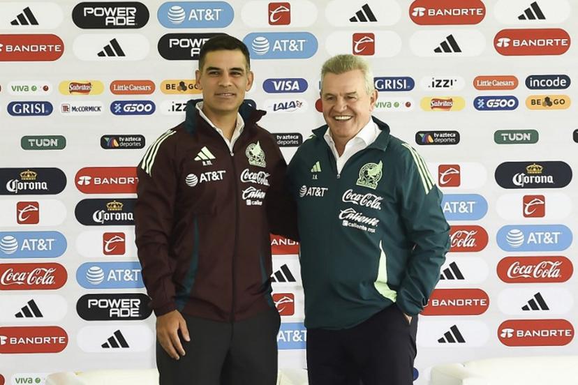 The new assistant coach, Rafael Marquez (L), and the new head coach, Javier Aguirre, pose for a picture during the presentation of the new technical staff for the Mexico National football team at the Centro de Alto Rendimiento in Mexico City on August 1, 2024.  Rodrigo Oropeza / AFP
