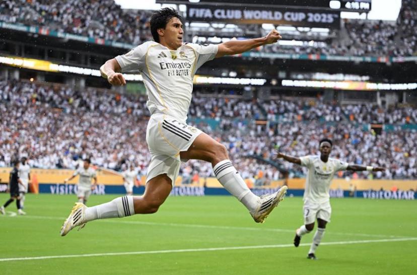Real Madrid's Spanish forward #30 Gonzalo Garcia celebrates after scoring the opening goal during the FIFA Club World Cup 2025 round of 16 football match between Spain's Real Madrid and Italy's Juventus at the Hard Rock Stadium in Miami on July 1, 2025.  PATRICIA DE MELO MOREIRA / AFP