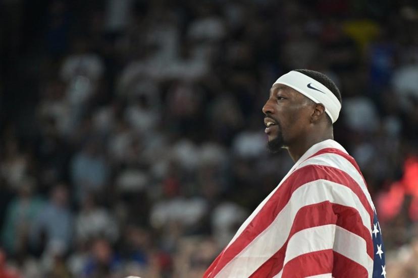USA's #13 Bam Adebayo celebrates after the USA won the men's Gold Medal basketball match between France and USA during the Paris 2024 Olympic Games at the Bercy  Arena in Paris on August 10, 2024.  Damien MEYER / AFP
