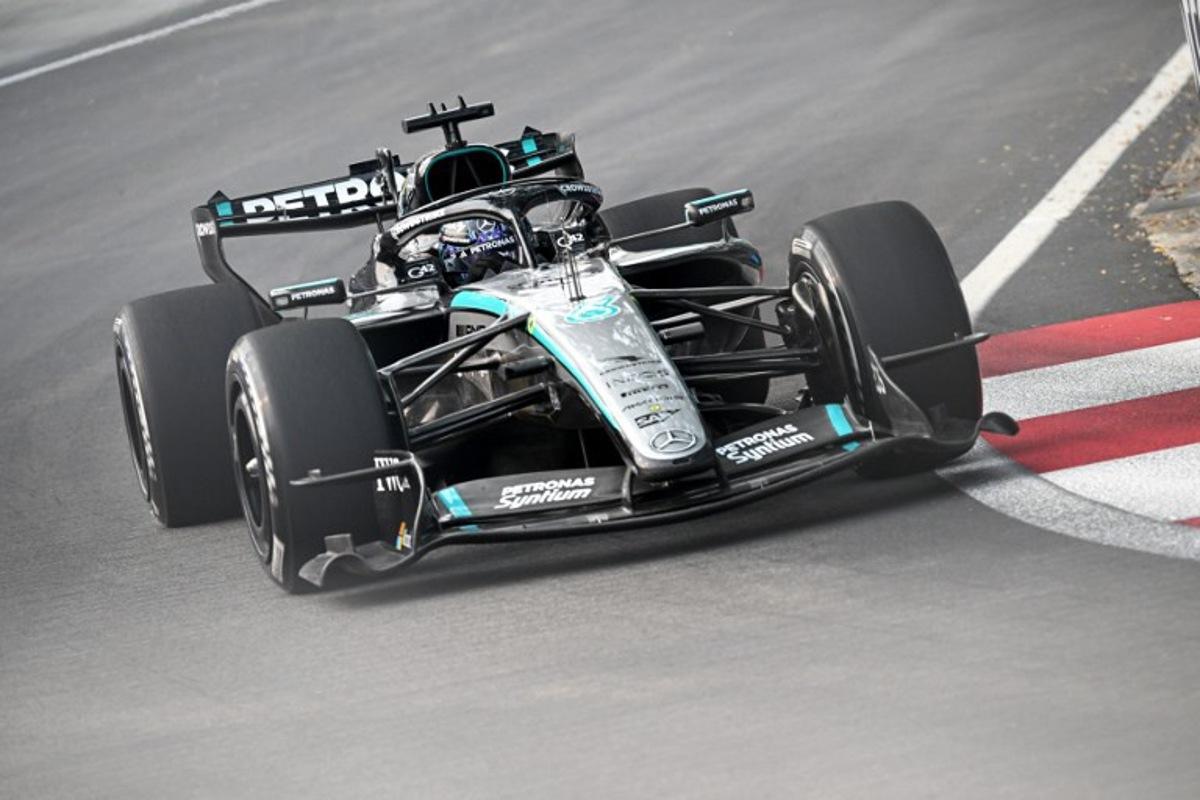 Mercedes' British driver George Russell drives during a practice session ahead of the Formula One Singapore Grand Prix at the Marina Bay Street Circuit in Singapore on October 9, 2026.  Lillian SUWANRUMPHA / AFP