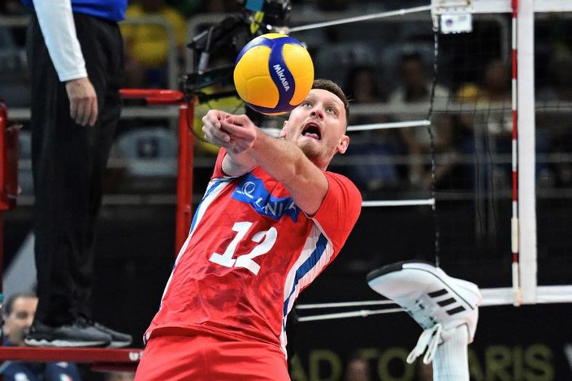 Czech Republic's Martin Licek returns the ball during the Pool A Volleyball Olympic Qualifier match against Italy in Rio de Janeiro, Brazil, on September 30, 2023.  CARL DE SOUZA / AFP