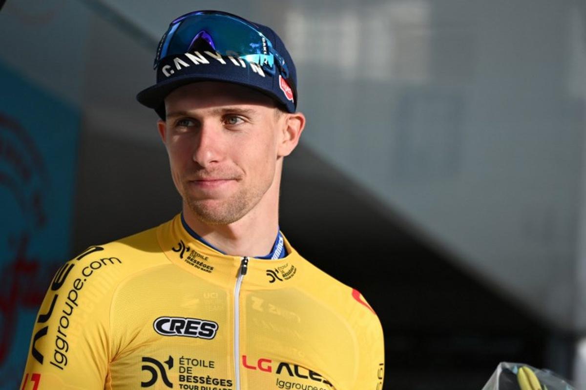 Team Alpecin-Deceuninck French cyclist Axel Laurance reacts on the podium after winning the second stage of the 54th edition of the Etoile de Besseges - Tour du Gard cycling race in Rousson, southern France, on February 1, 2024.  Sylvain THOMAS / AFP