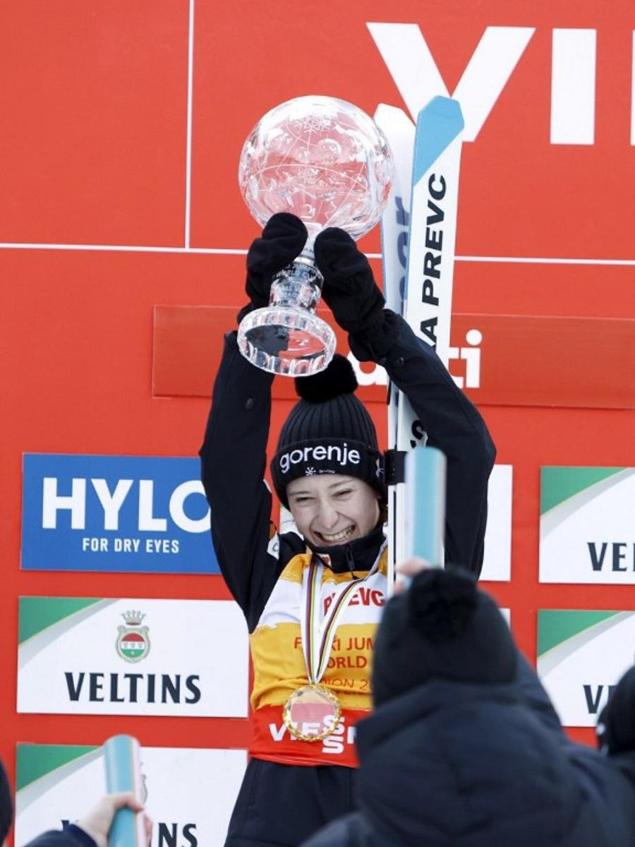 Slovenia's Nika Prevc celebrates the World Cup overall victory with the Crystal Ball after the women's HS130 ski jumping competition at the FIS Nordic World Cup Lahti Ski Games in Lahti, Finland, on March 21, 2025.   Pepe Korteniemi / Lehtikuva / AFP