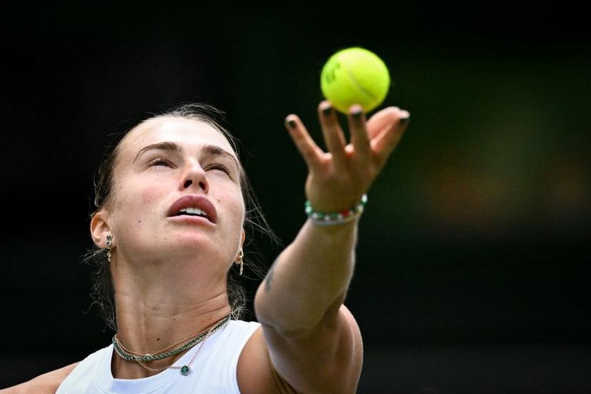 Belarus's Aryna Sabalenka serves to Czech Republic's Marie Bouzkova during their women's singles second round tennis match on the third day of the 2025 Wimbledon Championships at The All England Lawn Tennis and Croquet Club in Wimbledon, southwest London, on July 2, 2025.  Kirill KUDRYAVTSEV / AFP