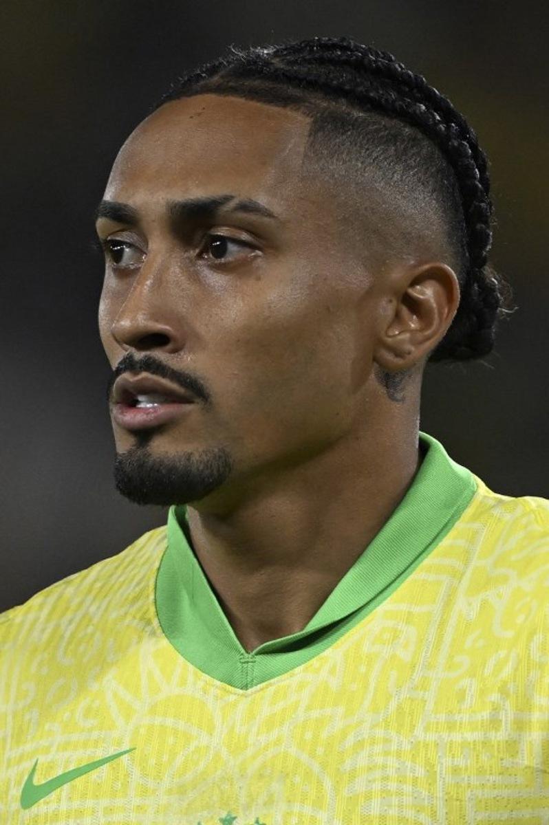 Brazil's forward #10 Rafinha looks on during the 2026 FIFA World Cup South American qualifiers football match between Brazil and Chile at the Maracana stadium in Rio de Janeiro, Brazil, on September 4, 2025.  Mauro PIMENTEL / AFP