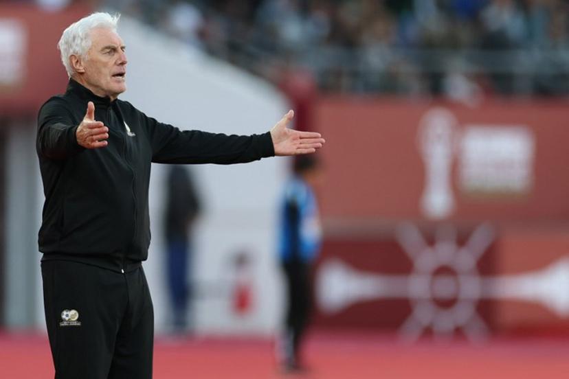 South Africa's head coach Hugo Broos reacts after being denied a penalty during the Africa Cup of Nations (CAN) Group B football match between Egypt and South Africa at Adrar Stadium in Agadir on December 26, 2025.   FRANCK FIFE / AFP