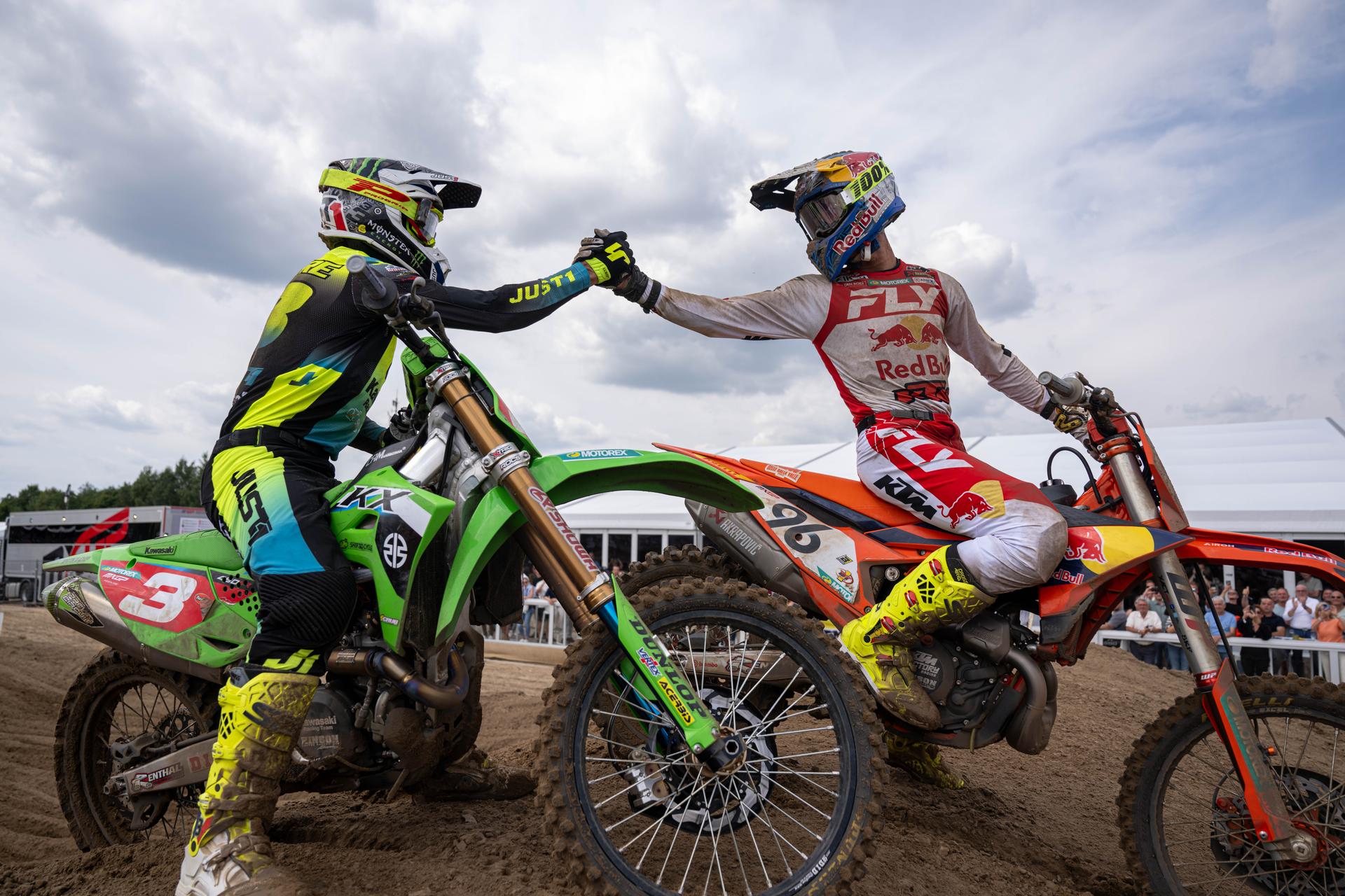 France's Romain Febvre and Belgium's Lucas Coenen celebrate after they crosses the finish line at the motocross MXGP Grand Prix Flanders, race 15/20 of the FIM Motocross World Championship, Sunday 03 August 2025 in Lommel. BELGA PHOTO JONAS ROOSENS