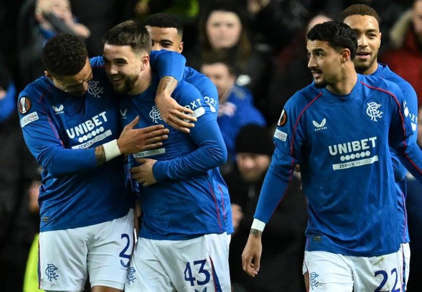 Rangers' Belgian midfielder #43 Nicolas Raskin (2L) celebrates scoring the opening goal during the UEFA Europa League football match between Rangers and Royale Union Saint-Gilloise at the Ibrox Stadium in Glasgow on January 30, 2025.  ANDY BUCHANAN / AFP
