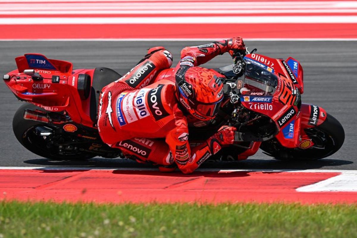 Ducati Lenovo Team's Spanish MotoGP rider Marc Marquez rides during the warm-up ahead of the MotoGP Indonesian Grand Prix at the Mandalika International Circuit in Mandalika, West Nusa Tenggara on October 5, 2025.  SONNY TUMBELAKA / AFP