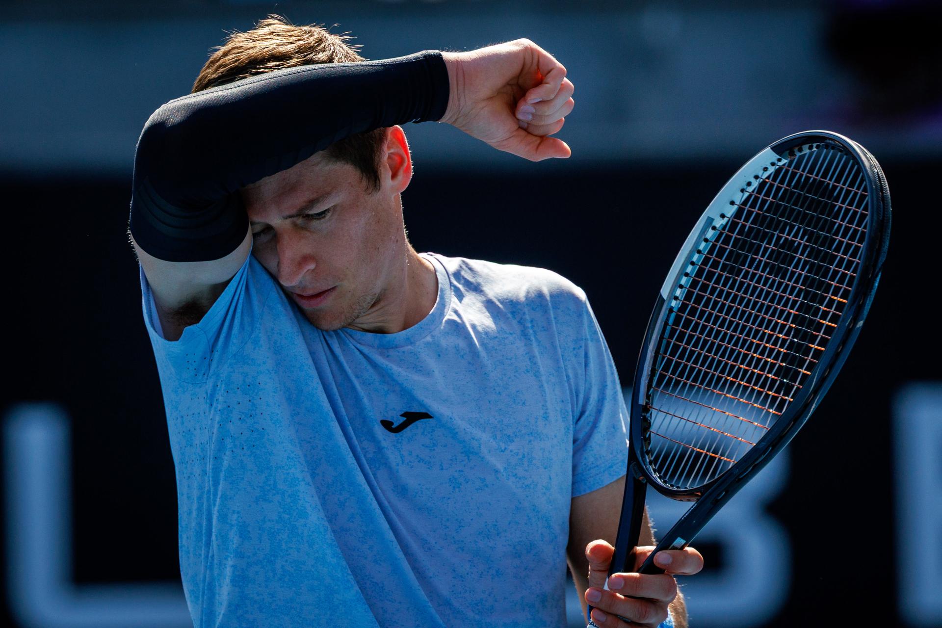 Belgium's Kimmer Coppejans reacts during a second round qualifying match in the men's singles against Switzerland's Riedi at the Australian Open, Melbourne Park, Melbourne on Wednesday 14 January 2026. Coppejans won 3-6, 6-3, 6-4. BELGA PHOTO PATRICK HAMILTON  --- BENELUX ONLY   ---