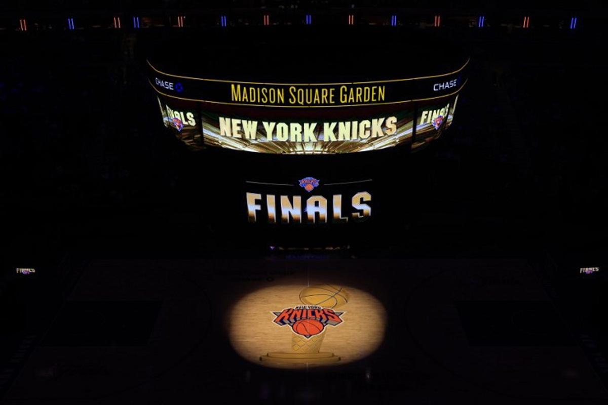 The court is seen ahead of Game 1 of the NBA Finals between the New York Knicks and the San Antonio Spurs as fans arrive to watch the match on a screen at Madison Square Garden in New York City on June 3, 2026.  TIMOTHY A. CLARY / AFP