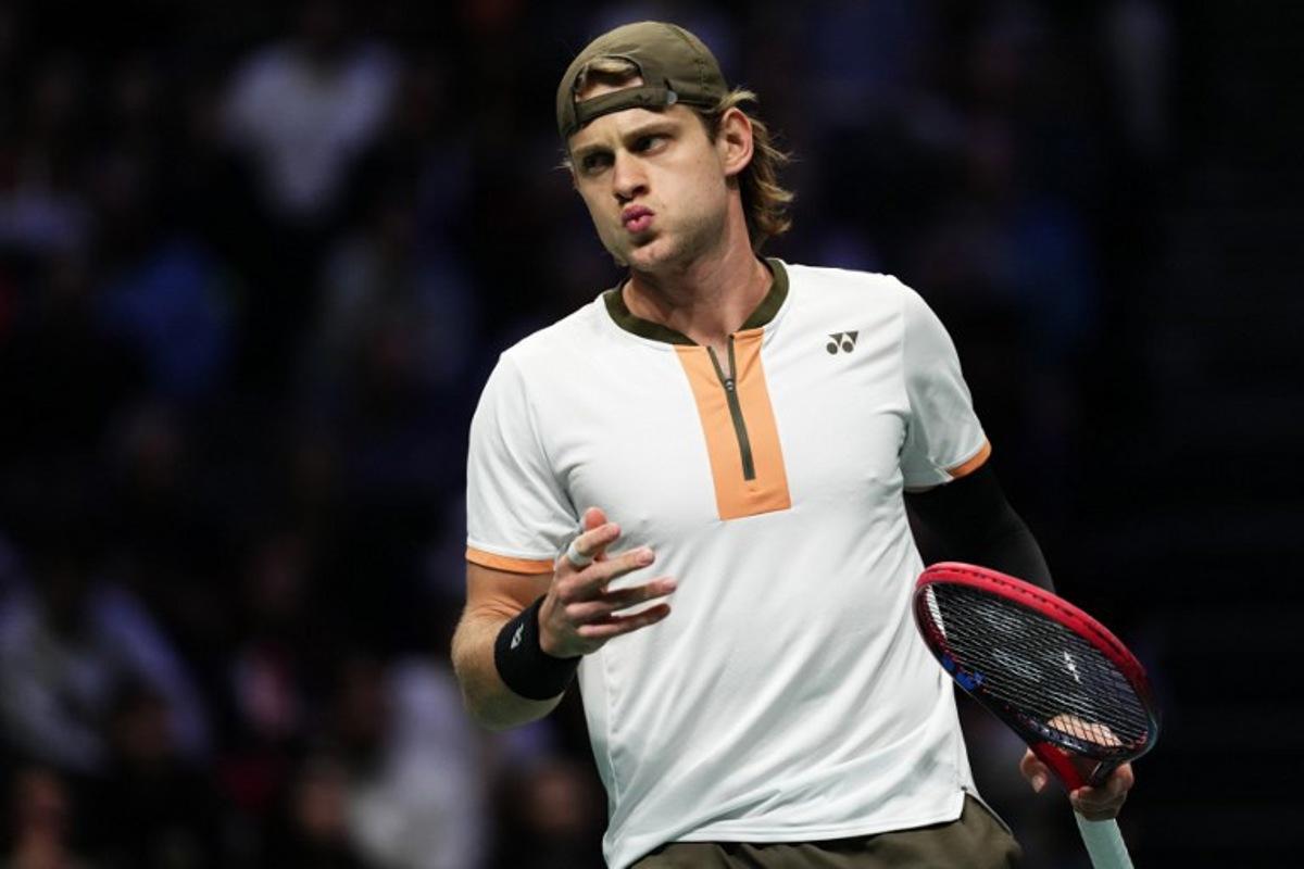 Belgium's Zizou Bergs reacts as he plays against Italy's Jannik Sinner during their men's singles match on day three of the Paris ATP Masters 1000 tennis tournament at the Paris La Défense Arena in Nanterre, on the outskirts of Paris, on October 29, 2025.  Dimitar DILKOFF / AFP