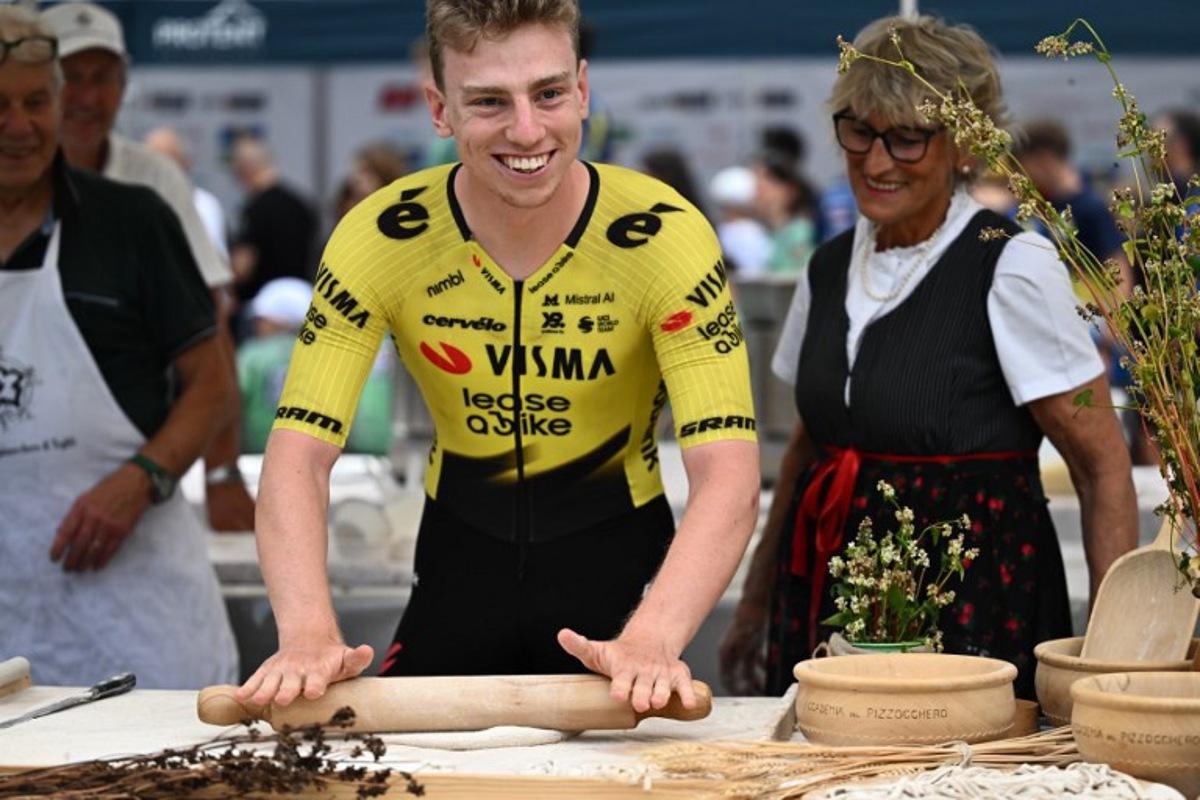 British rider Matthew Brennan of team Visma Lease a Bike attends the team presentation on the eve of the first stage of the Tour of Switzerland (Tour de Suisse) cycling race, in Sondrio, Italy, on June 16, 2026.  Marco BERTORELLO / AFP