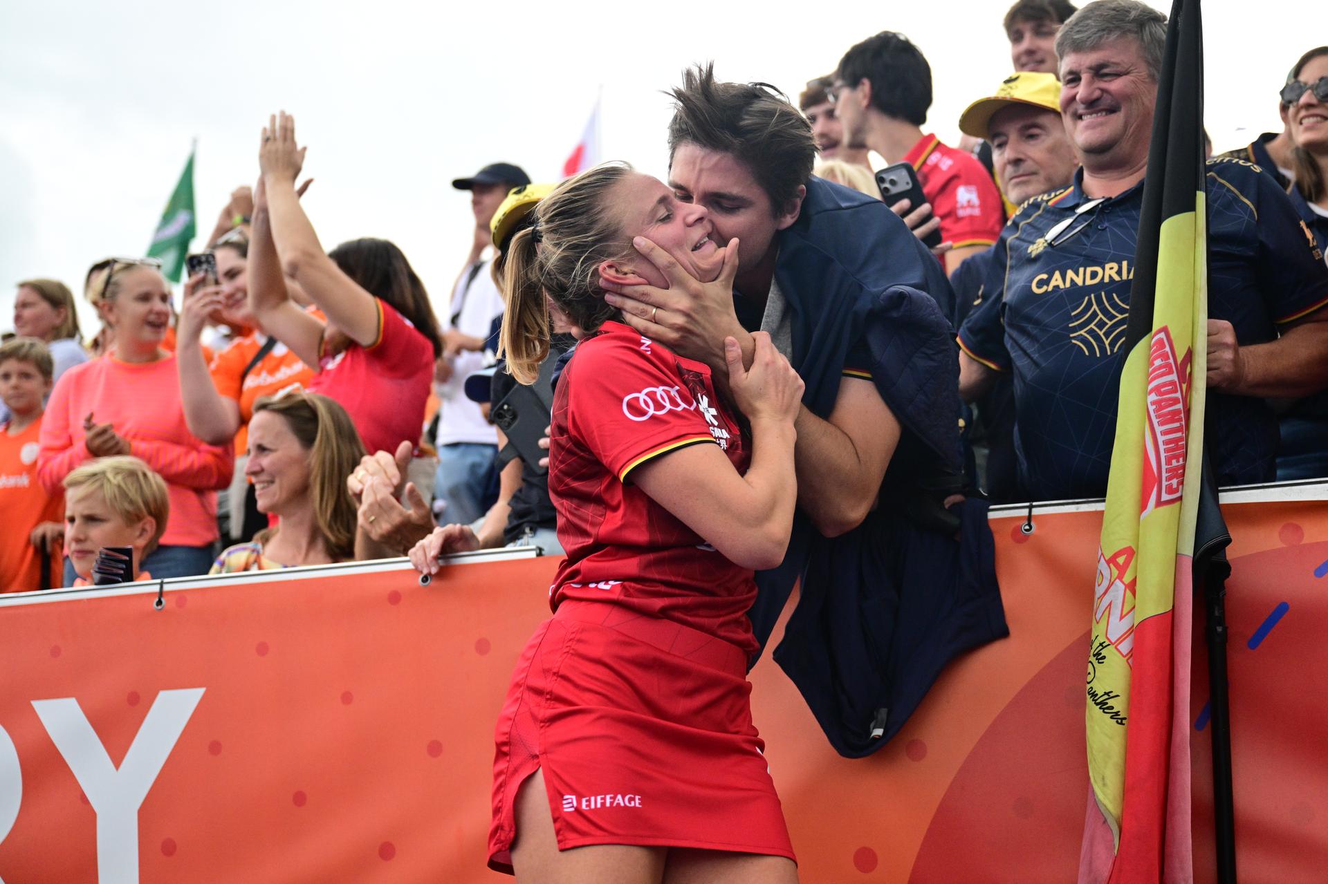 Belgium's Alix Gerniers celebrates with her partner after winning a field hockey game between Belgian national team Red Panthers and Australië, at the women's 2026 Hockey World Cup, on Saturday 29 August 2026 in Amsterdam. The 2026 edition of the Hockey World Cup takes place in Belgium and The Netherlands from August 15 to August 30. BELGA PHOTO DIRK WAEM