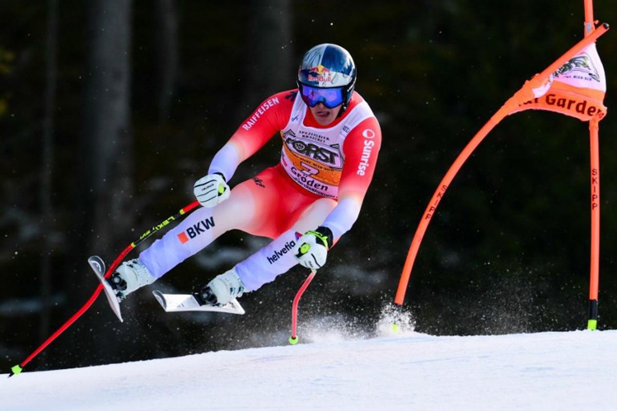 Switzerland's Franjo Von Allmen competes in the men's downhill race part of the FIS Alpine Ski World Cup 2025-2026, in Val Garderna, northern Italy, on December 20, 2025.  Stefano RELLANDINI / AFP