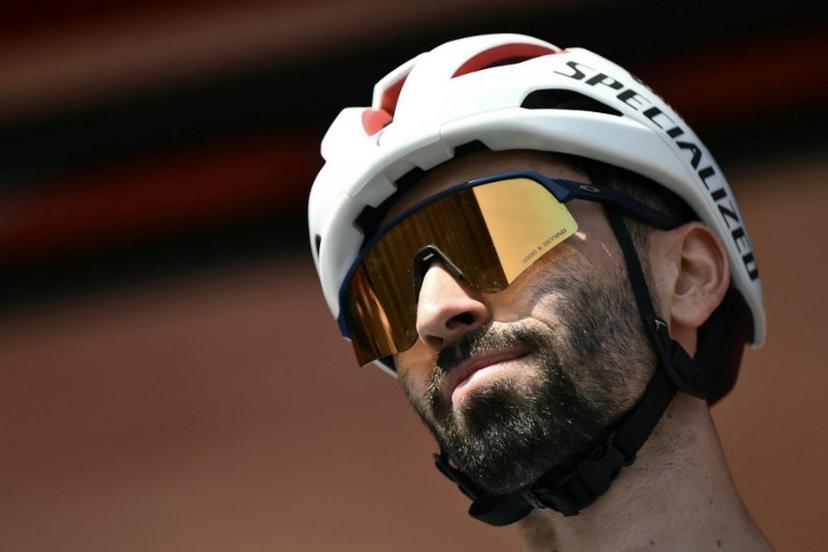 Team Soudal-Quick Step's French rider Valentin Paret-Peintre is presented on stage before the start of the Vuelta a Espana, a 183 km race between Torino - Reggia di Venaria and Novara, in Italy's Piemonte region, on August 23, 2025.    Marco BERTORELLO / AFP