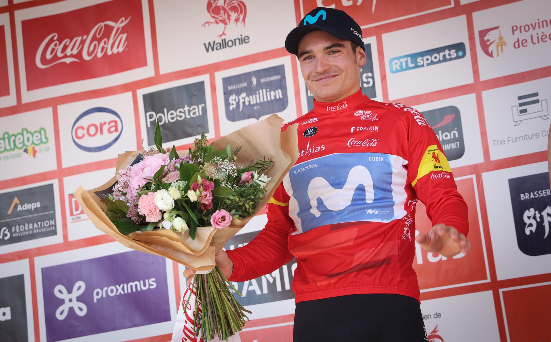 Spanish Carlos Canal of Movistar Team celebrates on the podium after stage 3 of the Tour De Wallonie cycling race, from Arlon to La-Roche-en-Ardenne (194 km), Wednesday 24 July 2024. This year's Tour de Wallonie takes place from 22 to 26 July 2023. BELGA PHOTO VIRGINIE LEFOUR
