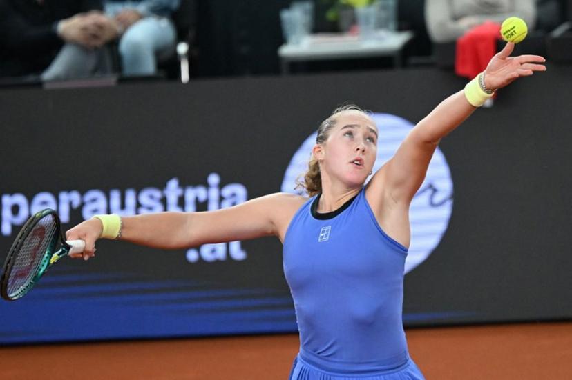 Mirra Andreeva serves the ball to Austria's Anastasia Potapova (not pictured) during their women's single final match of the WTA Upper Austria Women's Linz tennis tournament in Linz, Austria on April 12, 2026.  BARBARA GINDL / APA / AFP
