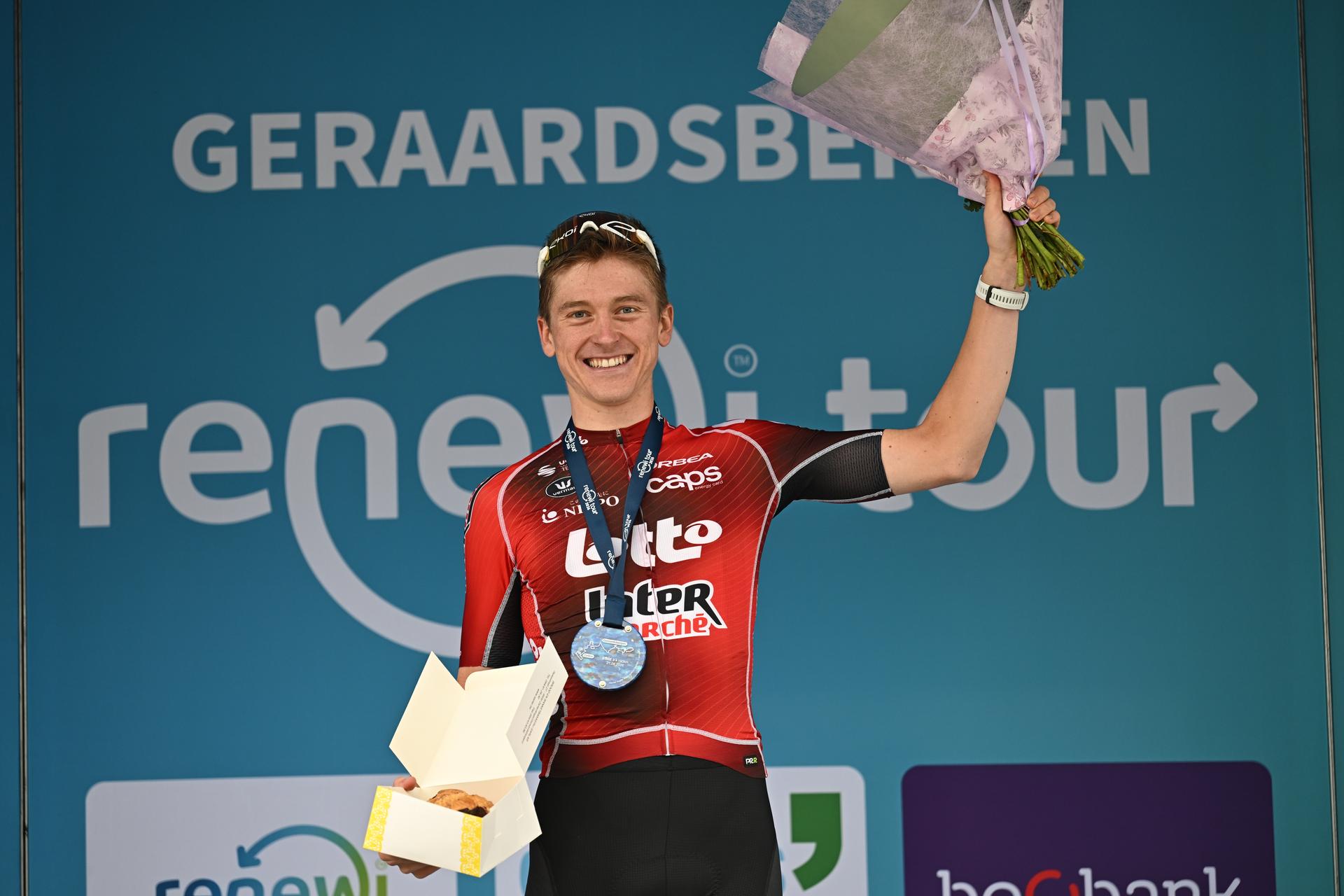 Belgian Jenno Berckmoes of Lotto-Intermarche celebrates on the podium after winning stage three of the 'Renewi Tour' multi-stage cycling race, from Celles to Geraardsbergen (182 km) on Friday 21 August 2026. The five-day race takes place from 19 to 23/08. BELGA PHOTO DAVID PINTENS