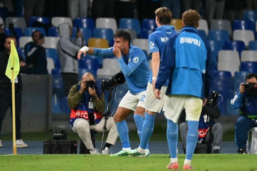 Napoli's Brazilian forward #23 Giovane celebrates Bodo/Glimt's Norwegian defender #04 Odin Bjørtuft own goal during the UEFA Champions League - first round day 3 football match between Napoli and Bodo Glimt at the Diego Armando Maradona stadium in Naples on October 20, 2026.  Alberto PIZZOLI / AFP