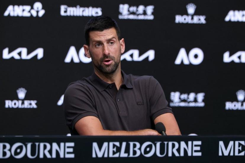 Serbia's Novak Djokovic speaks at a press conference ahead of the 2026 Australian Open tennis tournament in Melbourne on January 17, 2026.   DAVID GRAY / AFP