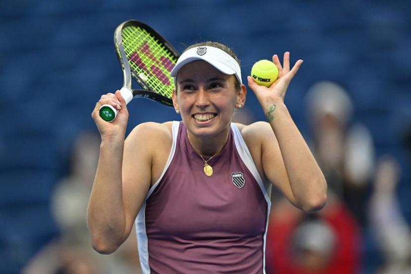 Belgium's Elise Mertens reacts as she celebrates her victory against USA's Coco Gauff during their women's singles match at the China Open tennis tournament in Beijing on October 7, 2026.   Adek BERRY / AFP