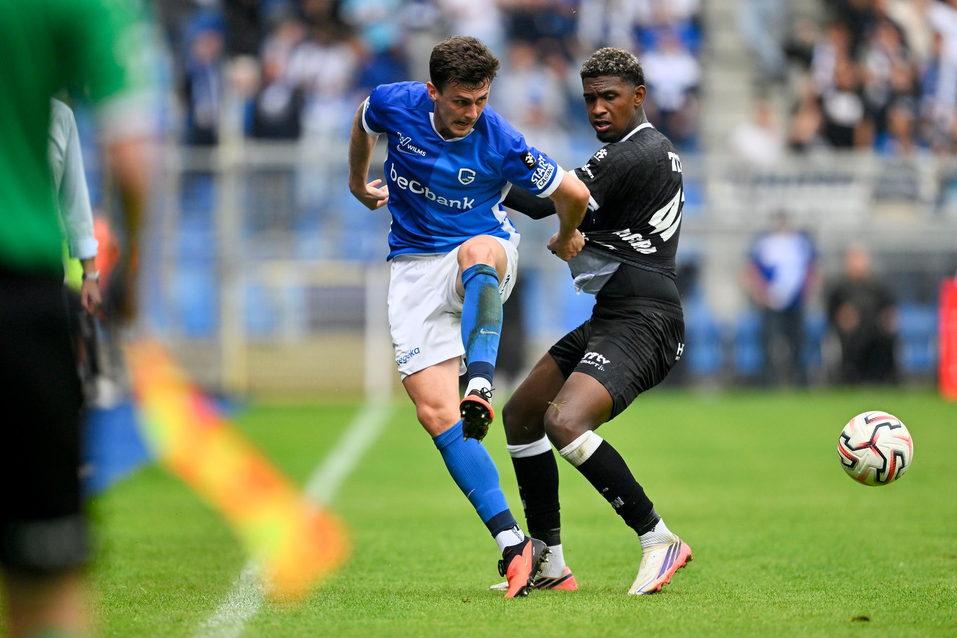 Genk's Benjamin Tahirovic and Gent's Josue Vergara fight for the ball during a soccer match between KRC Genk and KAA Gent, Sunday 13 September 2026 in Genk, on day 6 of the 2026-2027 'Jupiler Pro League' first division of the Belgian championship. BELGA PHOTO JOHAN EYCKENS