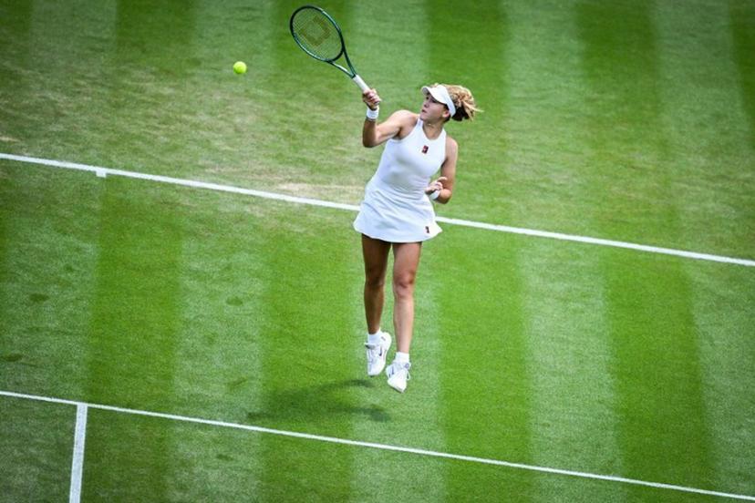 Russia's Mirra Andreeva plays a forehand return to Italy's Lucia Bronzetti during their women's singles second round tennis match on the fourth day of the 2025 Wimbledon Championships at The All England Lawn Tennis and Croquet Club in Wimbledon, southwest London, on July 3, 2025.  Kirill KUDRYAVTSEV / AFP