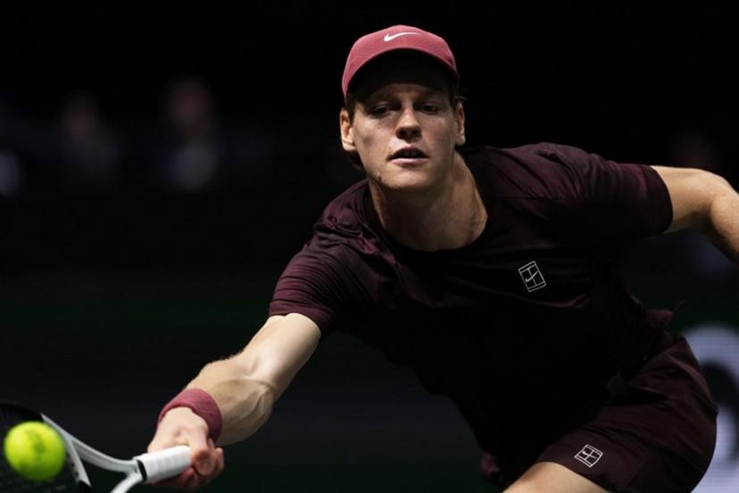 Italy's Jannik Sinner plays a forehand return to Belgium's Zizou Bergs during their men's singles match on day three of the Paris ATP Masters 1000 tennis tournament at the Paris La Défense Arena in Nanterre, on the outskirts of Paris, on October 29, 2025.  Dimitar DILKOFF / AFP