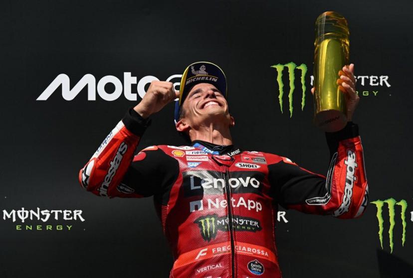 Team Ducati Lenovo Team's Marc Marquez celebrates on the podium after winning the MotoGP Grand Prix of Czechia in Brno, Czech Republic, on June 21, 2026.   Michal Cizek / AFP