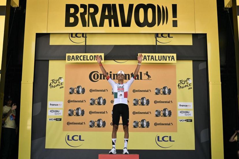 UAE Team Emirates - XRG's Mexican rider Isaac Del Toro celebrates on the podium after winning the 2nd stage of the 113th edition of the Tour de France cycling race, 168,5 km between Tarragona and Barcelona in northeastern Spain, on July 5, 2026.  Jeff PACHOUD / AFP