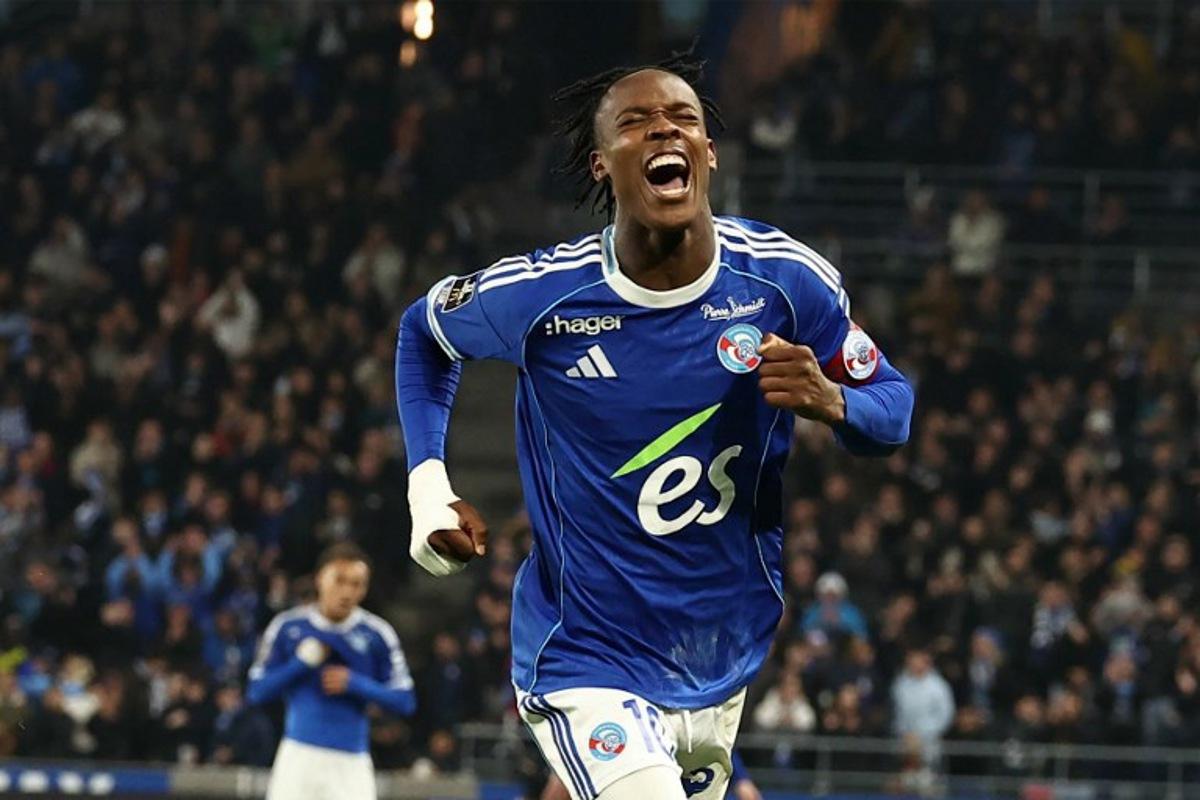 Strasbourg's Dutch forward #10 Emanuel Emegha celebrates after scoring his team's second goal during the French L1 football match between RC Strasbourg Alsace and Lille LOSC at the Stade de la Meinau in Strasbourg, eastern France, on November 9, 2025.  Frederick FLORIN / AFP