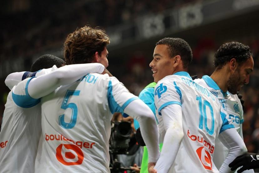 Marseille's English forward #10 Mason Greenwood (2nd, R) celebrates scoring his team's third goal with teammates during the French L1 football match between OGC Nice and Olympique de Marseille (OM) at the Allianz Riviera stadium in Nice, south-eastern France, on November 21, 2025.  Valery HACHE / AFP
