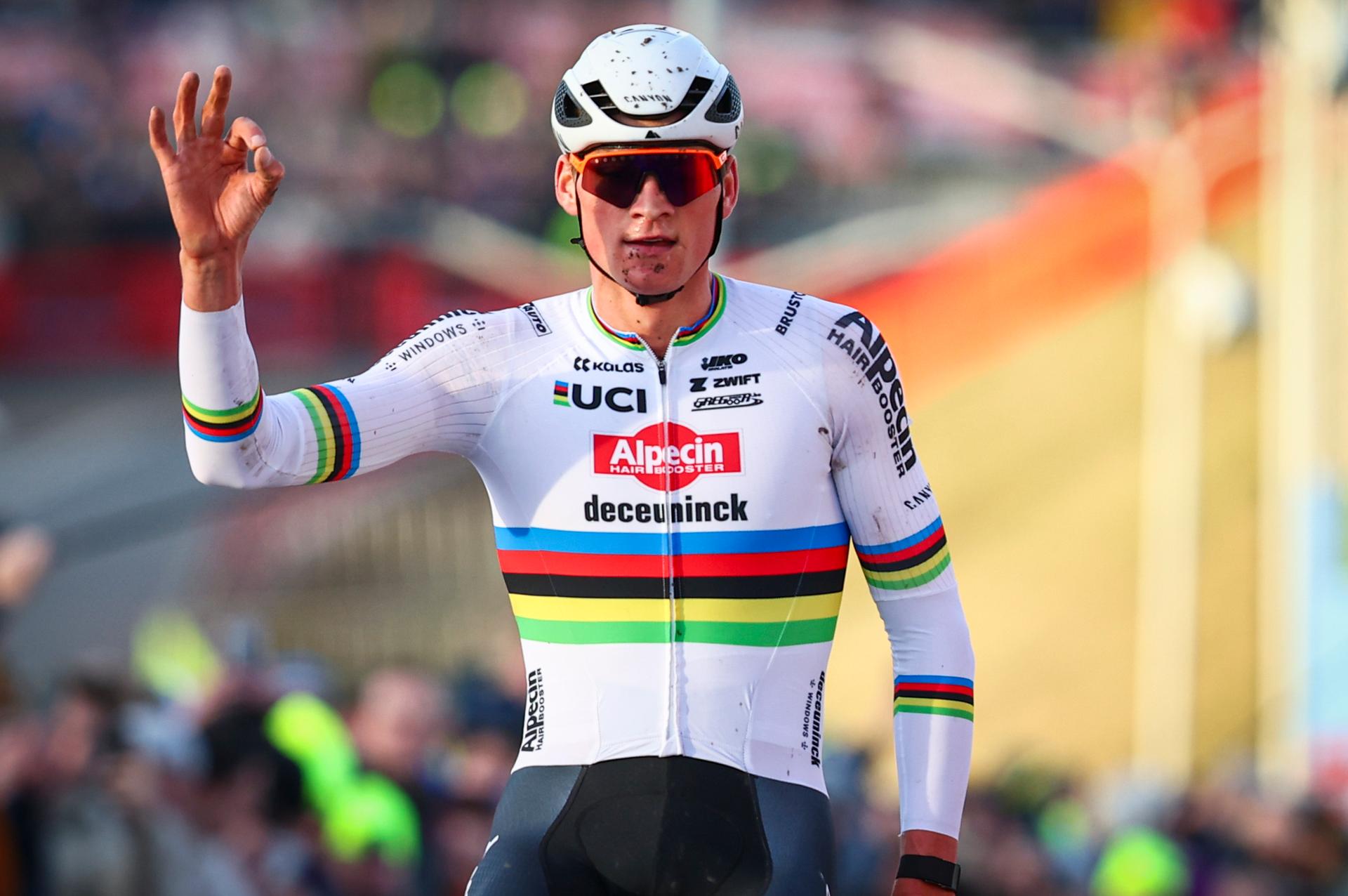 Dutch Mathieu Van Der Poel celebrates as he crosses the finish line to win the men's elite race at the cyclocross cycling event in Hoogerheide, Netherlands, Sunday 28 January 2024, stage 14/14 in the World Cup ranking. BELGA PHOTO JASPER JACOBS
