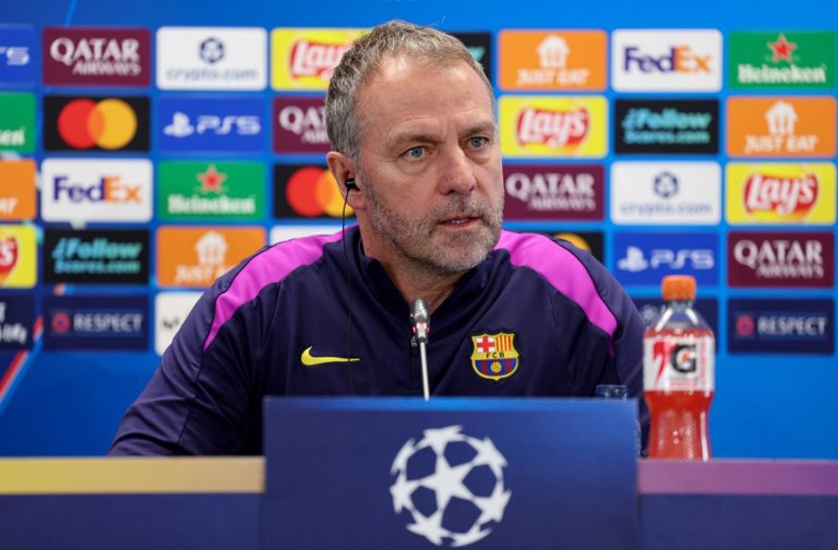 Barcelona's German coach Hans-Dieter Flick gives a press conference on the eve of their UEFA Champions League last 16 second leg football match against Newcastle United at the Joan Gamper training ground in Sant Joan Despi, near Barcelona, on March 17, 2026.  Josep LAGO / AFP