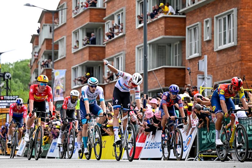 Belgian Tim Merlier of Soudal Quick-Step celebrates after winning the third stage of the 2025 Tour de France cycling, from Valenciennes to Dunkerque (178 km) on Monday 07 July 2025 in France. The 112th edition of the Tour de France starts on Saturday 5 July in Lille, France, and will finish in Paris, France on the 27th of July. BELGA PHOTO JASPER JACOBS