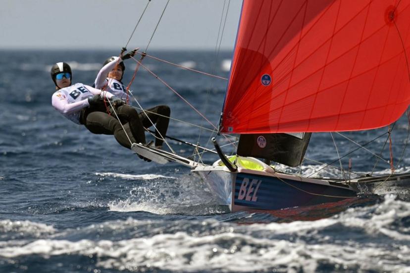 Belgium's duo Isaura Maenhaut and Anouk Geurts compete in Race 7 of the women's 49erFX skiff event during the Paris 2024 Olympic Games sailing competition at the Roucas-Blanc Marina in Marseille on July 30, 2024.   NICOLAS TUCAT / AFP