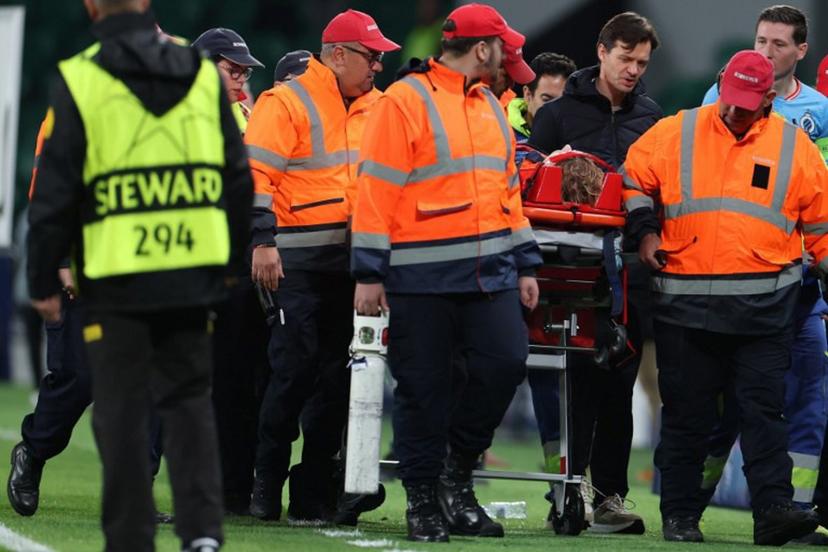 Club Brugge's Belgian goalkeeper #29 Nordin Jackers is carried on a stretcher after resulting injured during the UEFA Champions League, league phase day 5 football match between Sporting CP and Club Brugge at Jose Alvalade stadium in Lisbon on November 26, 2025.  PATRICIA DE MELO MOREIRA / AFP