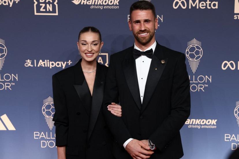 Spain and Athletic Bilbao goalkeeper Unai Simon (R) poses upon arrival to attend the 2026 Ballon d'Or France Football award ceremony at the Palladium Theatre in London on October 26, 2026.  Toby Shepheard / AFP