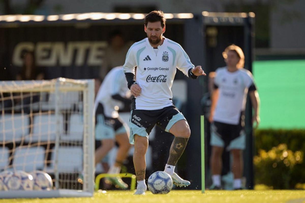 Argentina's forward Lionel Messi controls the ball during a football training session at the Argentine Football Association (AFA) training camp in Ezeiza, Buenos Aires Province, on October 5, 2026, ahead of the friendly match against Benin.  JUAN MABROMATA / AFP
