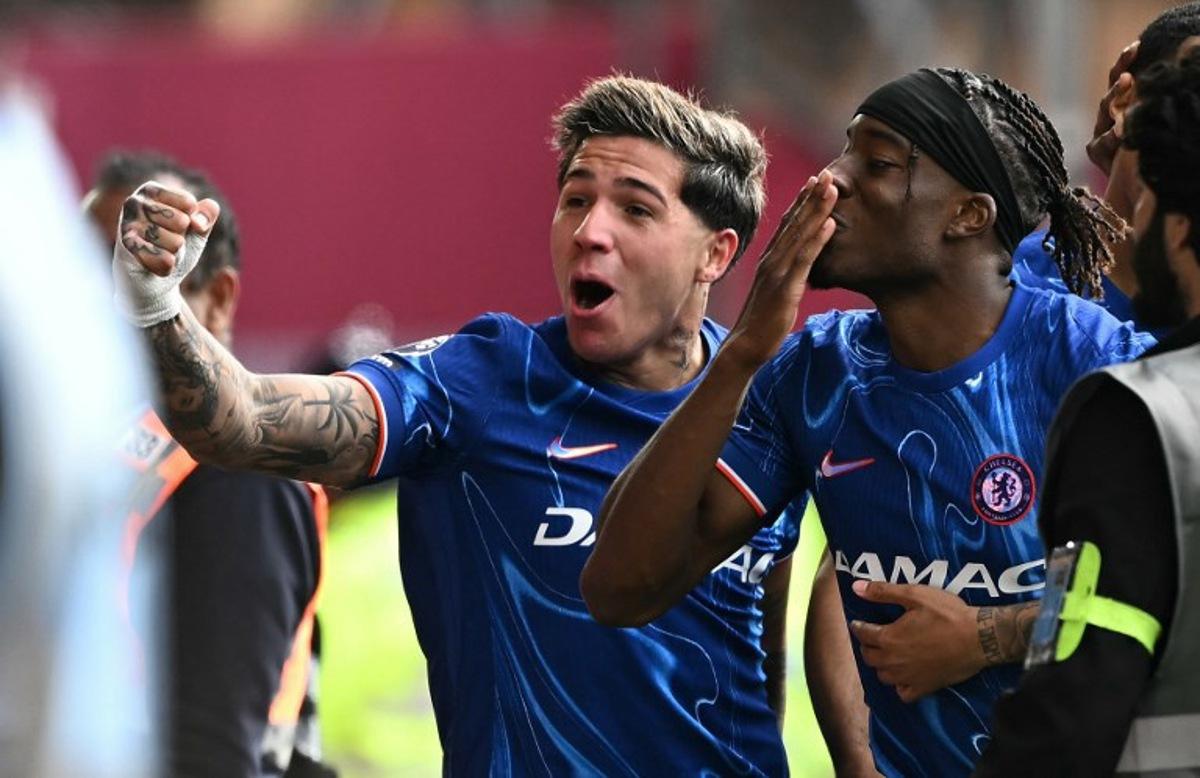 Chelsea's Argentinian midfielder #08 Enzo Fernandez (L) and Chelsea's English midfielder #11 Noni Madueke celebrate their team's goal during the English Premier League football match between Nottingham Forest and Chelsea at The City Ground in Nottingham, central England, on May 25, 2025.  Ben STANSALL / AFP