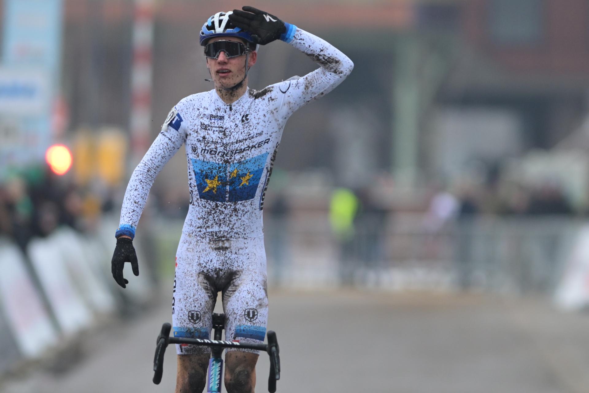 Belgian Lars Peers celebrates as he crosses the finish line to win the Novices second year men race at the Belgian Cyclocross Championships in Beringen on Sunday 11 January 2026. BELGA PHOTO DAVID PINTENS