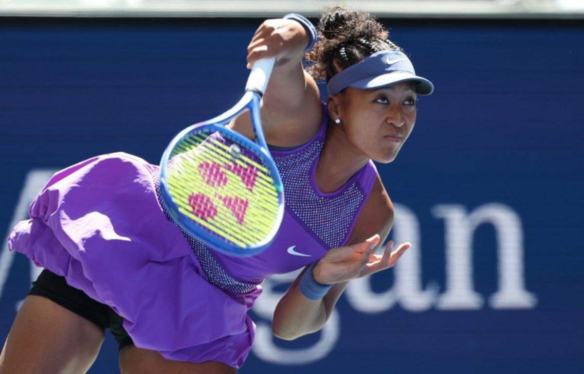 Japan's Naomi Osaka serves to Australia's Daria Kasatkina during their women's singles third round match on day seven of the US Open tennis tournament at the USTA Billie Jean King National Tennis Center in New York City, on August 30, 2025.  TIMOTHY A. CLARY / AFP